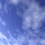 The golden sun, blue sky, veil clouds