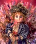 Image of doll with bouquet of flowers