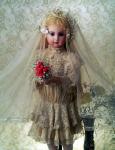 Photography of doll-fiancee with nosegay