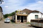 Amusing pictures an abandoned house with a McDonald's logo