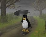 Subject to the desktop with Tux the penguin under the umbrella