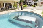 0706_car_in_pool.jpg