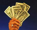 Photo of the American dollars in a hand