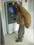 Photography of the beggar at a cash dispense