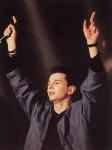 photo by David Gahan on stage with their hands up