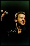 concert photos of smiling Dave Gahan